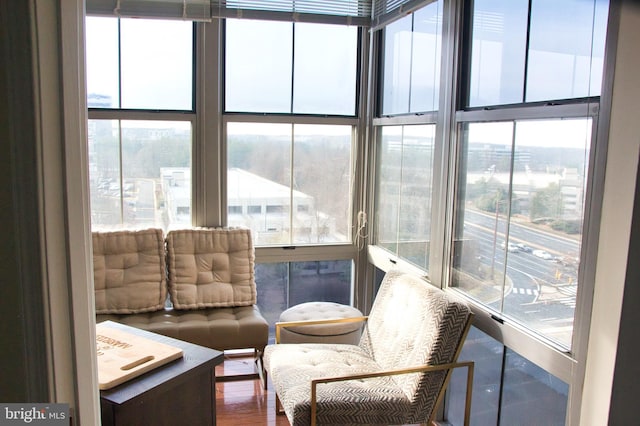 sunroom / solarium featuring plenty of natural light