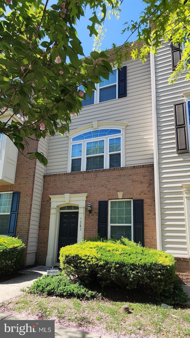 multi unit property with brick siding