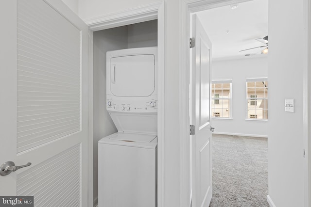 7583 Hearthside Way, Elkridge, MD 21075 - laundry room with stacked washer and clothes dryer, carpet flooring, ceiling fan, and baseboards