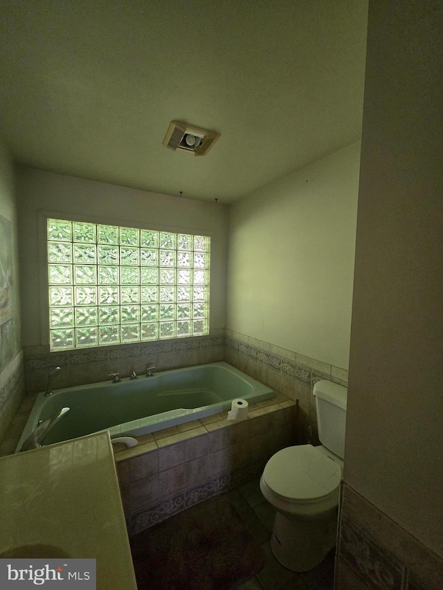 3450 Middle Ridge Rd, Newport, PA 17074 - full bathroom featuring a garden tub and toilet