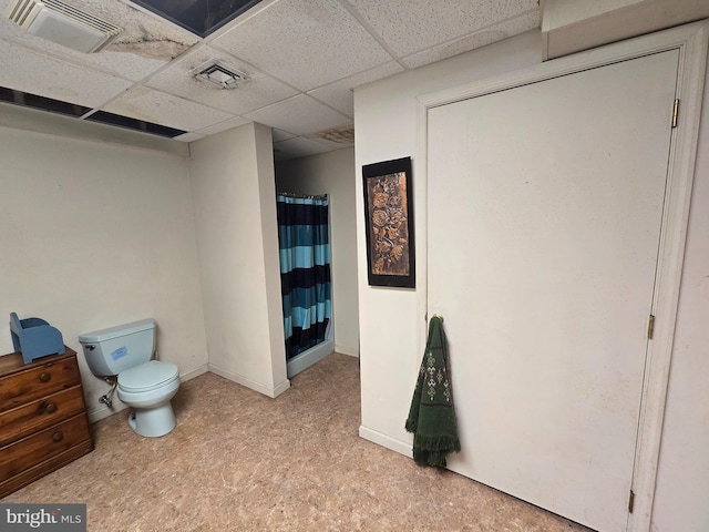 3450 Middle Ridge Rd, Newport, PA 17074 - full bath with toilet, a paneled ceiling, a shower with curtain, and baseboards