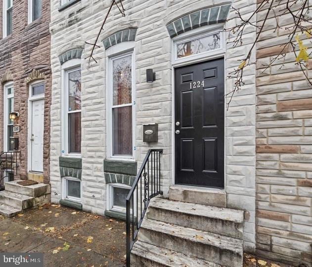 1224 James St, Baltimore, MD 21223 - view of exterior entry featuring stone siding