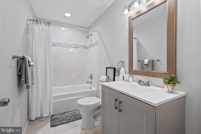 1224 James St, Baltimore, MD 21223 - bathroom featuring tile patterned flooring, vanity, toilet, and shower / tub combo