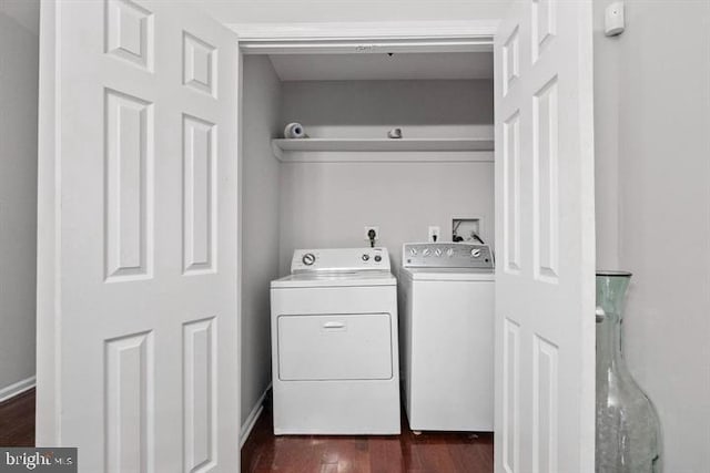 1224 James St, Baltimore, MD 21223 - laundry room with washing machine and clothes dryer and dark wood-type flooring