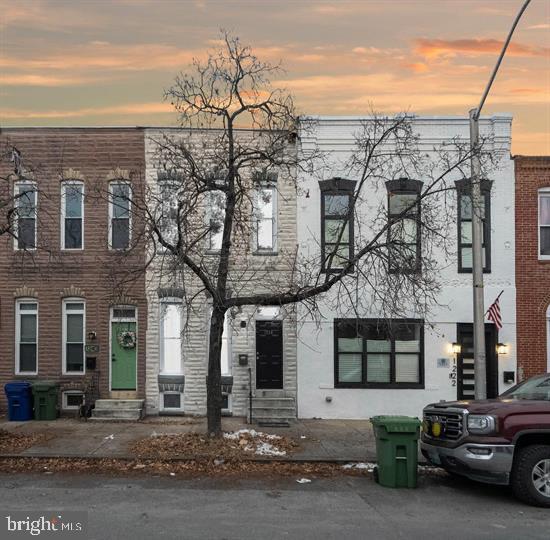 1224 James St, Baltimore, MD 21223 - townhome / multi-family property with entry steps