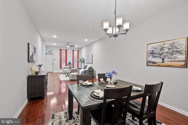 1224 James St, Baltimore, MD 21223 - dining room featuring a chandelier, wood finished floors, a ceiling fan, baseboards, and recessed lighting