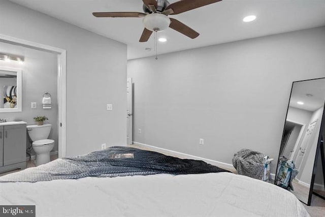 1224 James St, Baltimore, MD 21223 - bedroom with ensuite bathroom, recessed lighting, baseboards, and a ceiling fan