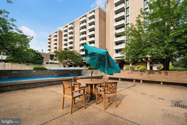 1250 4th St SW Unit W203, Washington, DC 20024 - view of pool with a patio and outdoor dining space