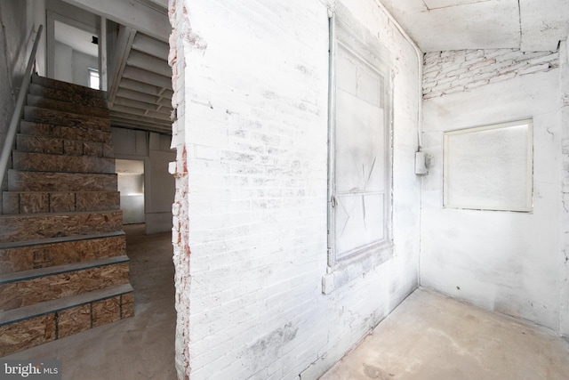 basement featuring stairs
