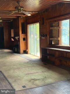 5573 Rte 9, Tuckerton, NJ 08087 - living area featuring wooden walls, plenty of natural light, and ceiling fan