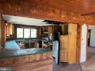 5573 Rte 9, Tuckerton, NJ 08087 - kitchen with wooden walls and electric range oven