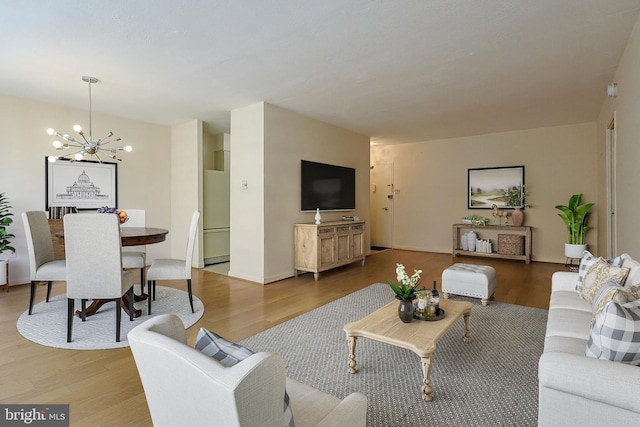 1900 John F Kennedy Blvd Unit 2003, Philadelphia, PA 19103 - living room with a chandelier and light wood-style floors