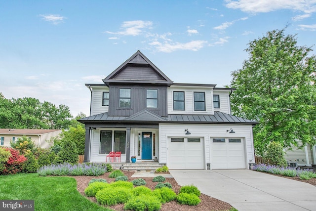302 Jade Ct NW, Vienna, VA 22180 - view of front of home featuring driveway, a porch, a standing seam roof, an attached garage, and metal roof