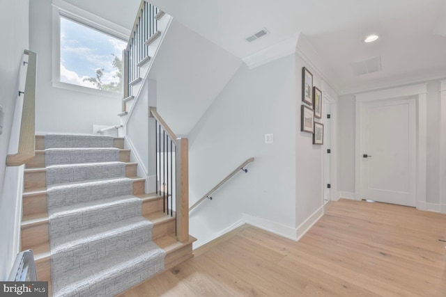 302 Jade Ct NW, Vienna, VA 22180 - stairway with wood finished floors, baseboards, and recessed lighting
