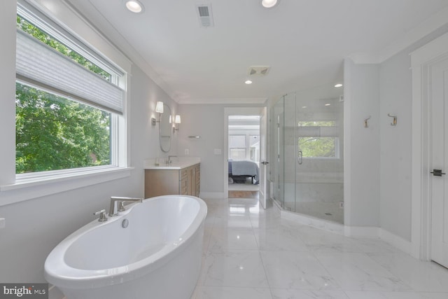 302 Jade Ct NW, Vienna, VA 22180 - ensuite bathroom with plenty of natural light, a stall shower, baseboards, recessed lighting, and ornamental molding