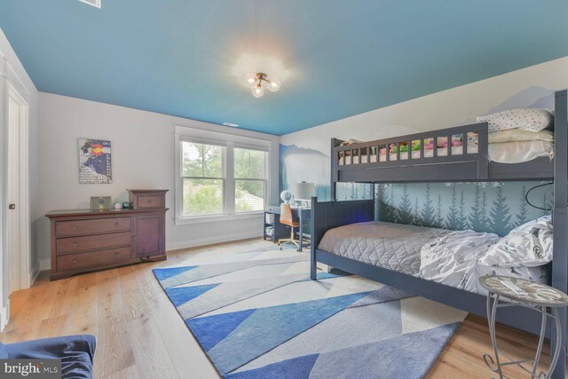 302 Jade Ct NW, Vienna, VA 22180 - bedroom with wood finished floors and baseboards