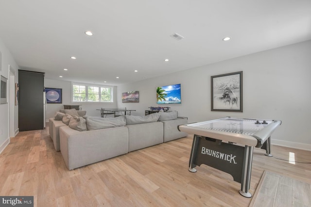 302 Jade Ct NW, Vienna, VA 22180 - living room with light wood-style floors, recessed lighting, and baseboards