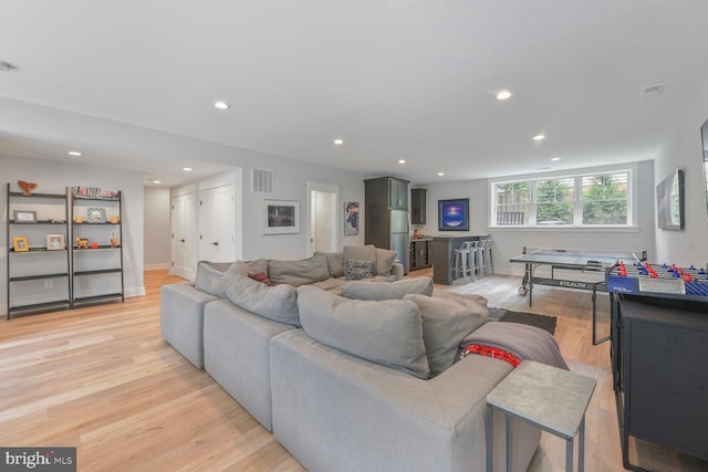 302 Jade Ct NW, Vienna, VA 22180 - living room featuring light wood-style flooring, recessed lighting, and baseboards