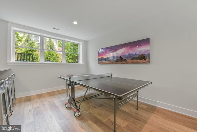 302 Jade Ct NW, Vienna, VA 22180 - rec room featuring healthy amount of natural light, baseboards, light wood-style floors, and recessed lighting