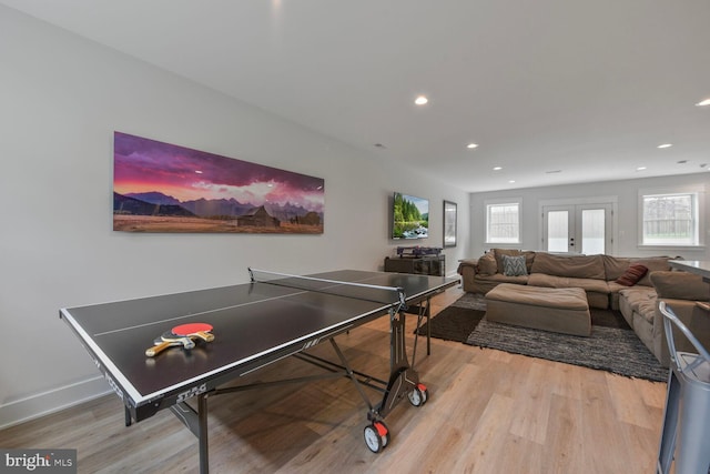 302 Jade Ct NW, Vienna, VA 22180 - recreation room featuring wood finished floors, recessed lighting, plenty of natural light, and baseboards