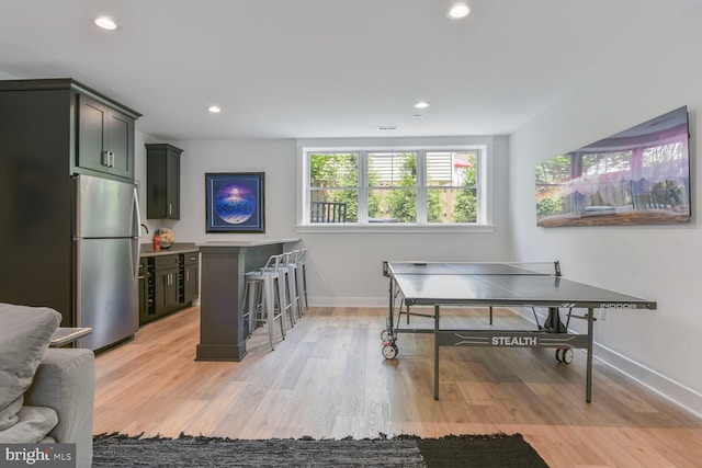 302 Jade Ct NW, Vienna, VA 22180 - recreation room featuring light wood-style flooring, baseboards, and recessed lighting