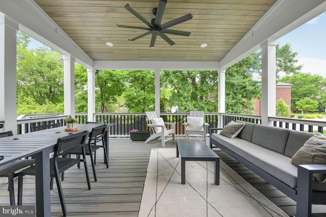 302 Jade Ct NW, Vienna, VA 22180 - wooden deck featuring outdoor lounge area, outdoor dining space, and a ceiling fan