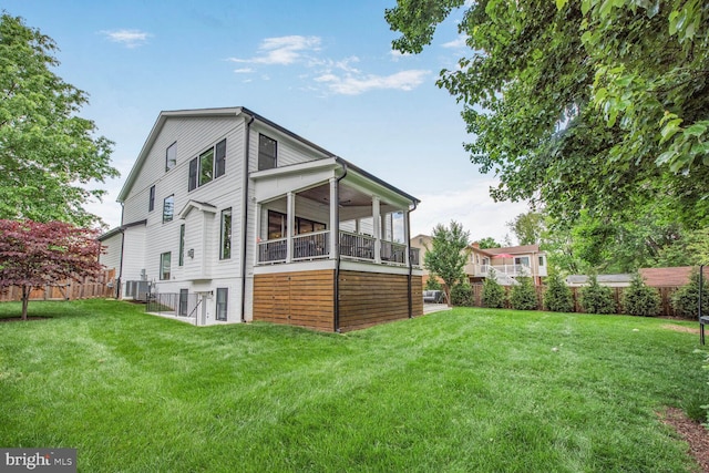 302 Jade Ct NW, Vienna, VA 22180 - rear view of house with cooling unit, a sunroom, and a ceiling fan