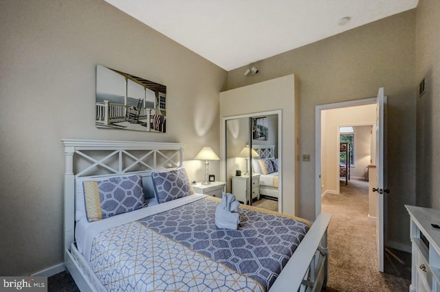 bedroom featuring carpet flooring and baseboards