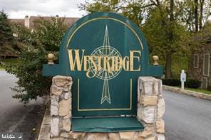 view of community sign