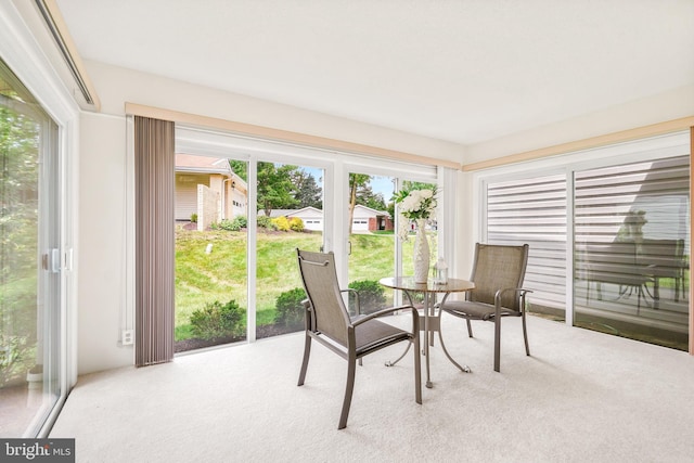 sunroom featuring plenty of natural light