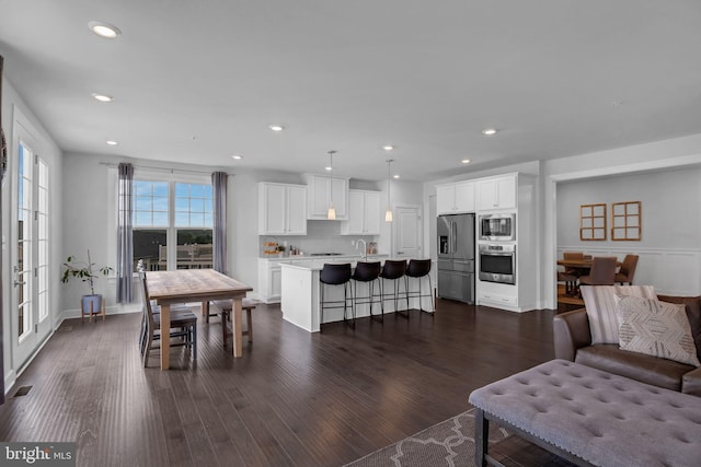 718 Quarry Point Rd, Malvern, PA 19355 - living area with dark wood-style floors, recessed lighting, and baseboards