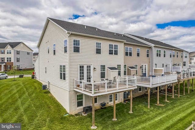 718 Quarry Point Rd, Malvern, PA 19355 - back of house with central AC, a lawn, and a wooden deck