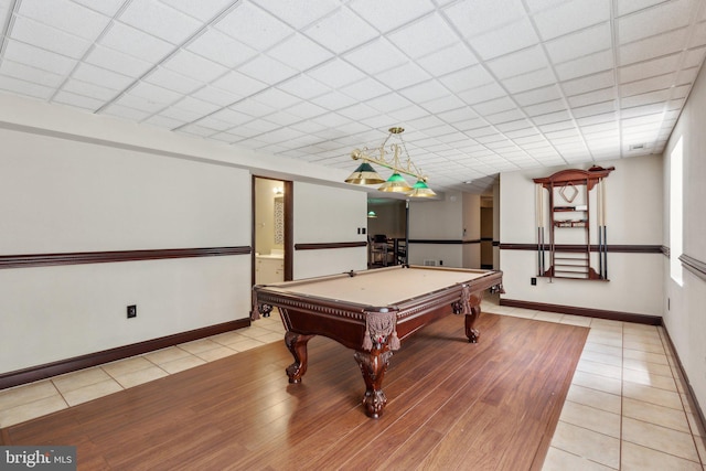 recreation room with billiards, light wood-style floors, and baseboards