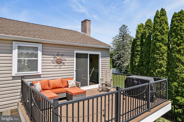wooden terrace featuring outdoor lounge area