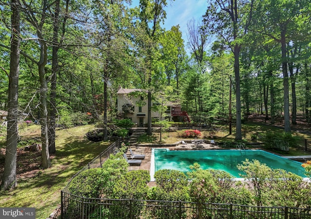 view of pool with fence