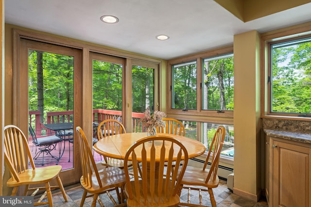 dining room with recessed lighting
