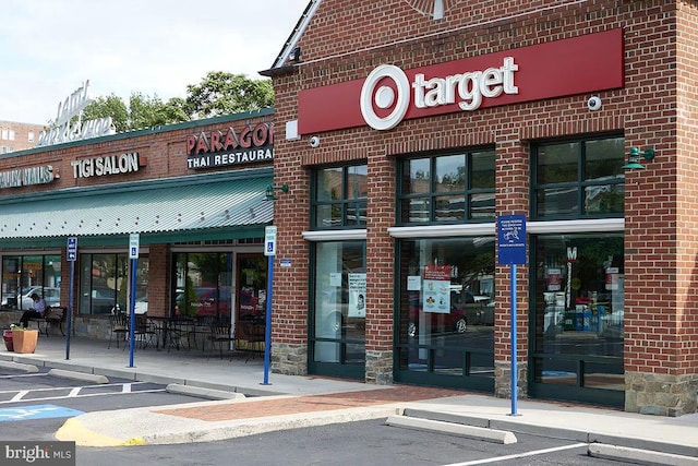 view of commercial location with uncovered parking