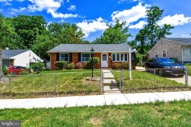 1210 Lindsay Rd, Oxon Hill, MD 20745 - view of front of house featuring a gate and brick siding