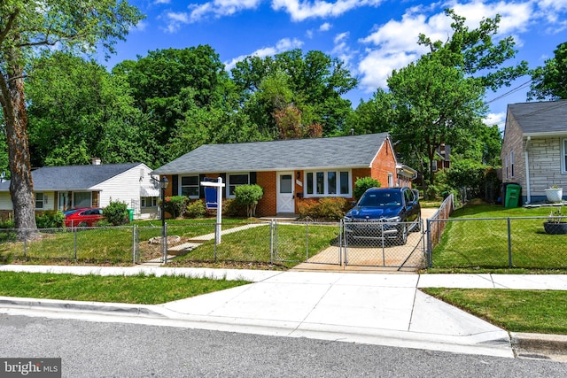 1210 Lindsay Rd, Oxon Hill, MD 20745 - ranch-style home with a gate, driveway, and brick siding