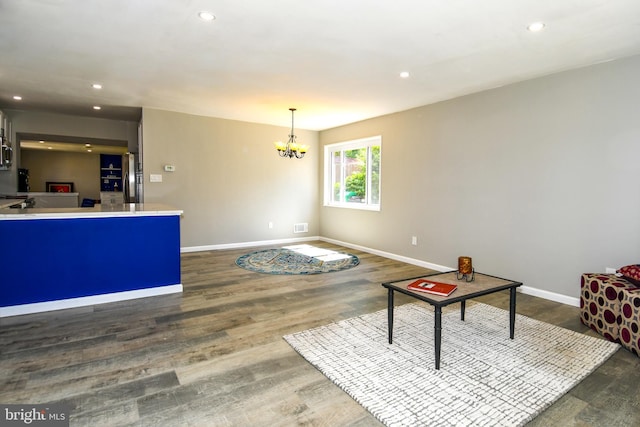 1210 Lindsay Rd, Oxon Hill, MD 20745 - living room with dark wood finished floors, a chandelier, baseboards, and recessed lighting