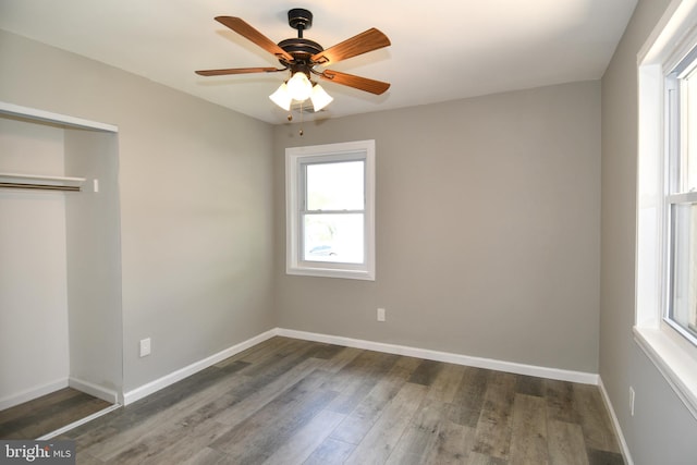 1210 Lindsay Rd, Oxon Hill, MD 20745 - unfurnished bedroom with wood finished floors, a closet, baseboards, and a ceiling fan