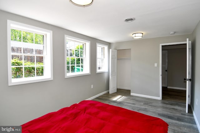 1210 Lindsay Rd, Oxon Hill, MD 20745 - bedroom with wood finished floors, baseboards, and a closet