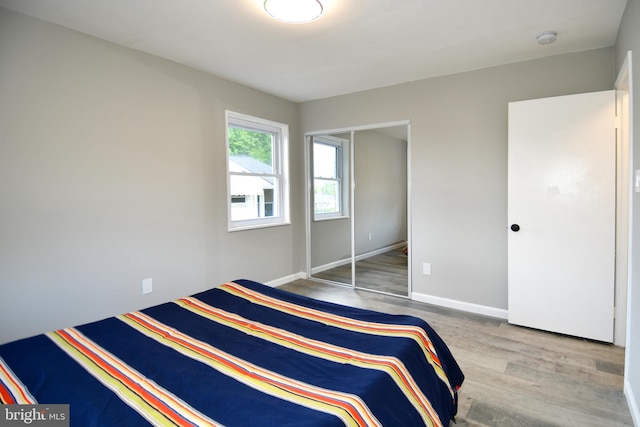 1210 Lindsay Rd, Oxon Hill, MD 20745 - unfurnished bedroom featuring wood finished floors and baseboards