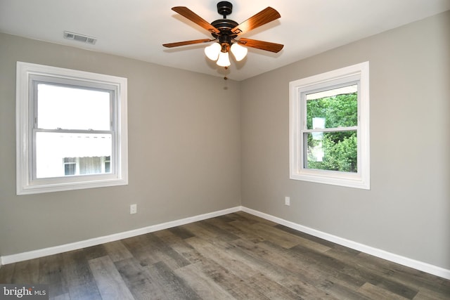 1210 Lindsay Rd, Oxon Hill, MD 20745 - spare room with baseboards, dark wood-style floors, and a ceiling fan