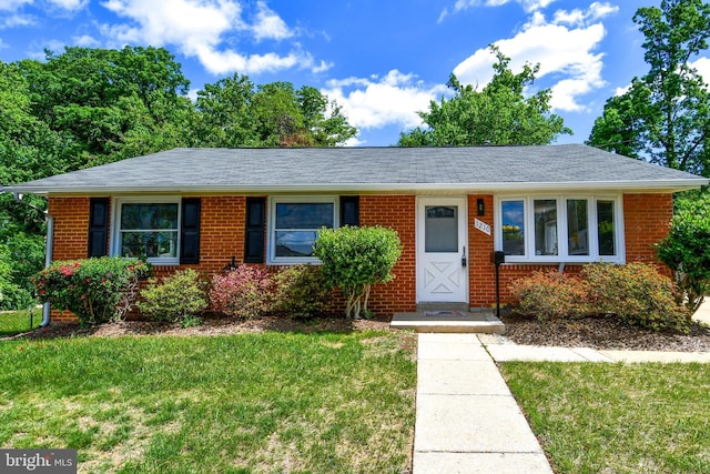 1210 Lindsay Rd, Oxon Hill, MD 20745 - single story home with a front yard, brick siding, and a shingled roof