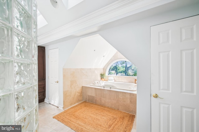 1233 Boucher Ave, Annapolis, MD 21403 - bathroom featuring a skylight, a garden tub, tile walls, and tile patterned floors