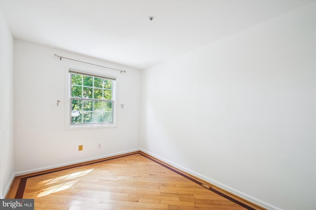 1233 Boucher Ave, Annapolis, MD 21403 - unfurnished room with light wood-style flooring, baseboards, and fire sprinkler in ceiling