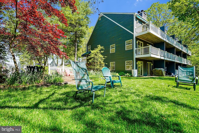 1233 Boucher Ave, Annapolis, MD 21403 - back of house featuring a lawn, a chimney, and central AC