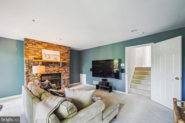 1233 Boucher Ave, Annapolis, MD 21403 - carpeted living area with baseboards, stairs, and a stone fireplace