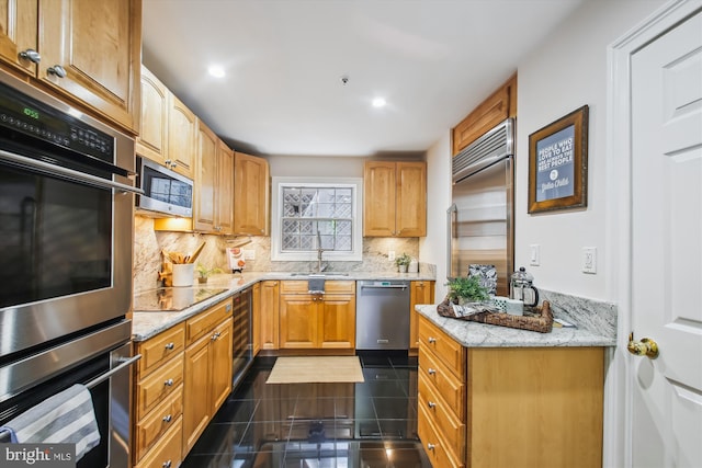 1233 Boucher Ave, Annapolis, MD 21403 - kitchen with stainless steel appliances, tasteful backsplash, light stone countertops, a sink, and wine cooler